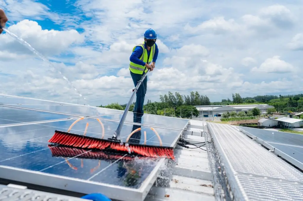 Solar roof cleaning, Professional technicians were washing and the surface of the solar panels